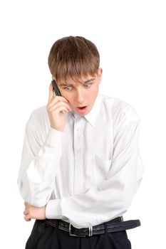amazed teenager with mobile phone isolated on the white background