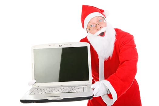surprised santa claus showing laptop computer with empty screen. isolated on the white background