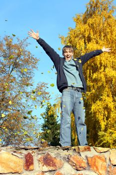 happy teenager in the autumn park