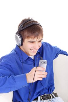 happy teenager with mobile phone in a chair on the white background