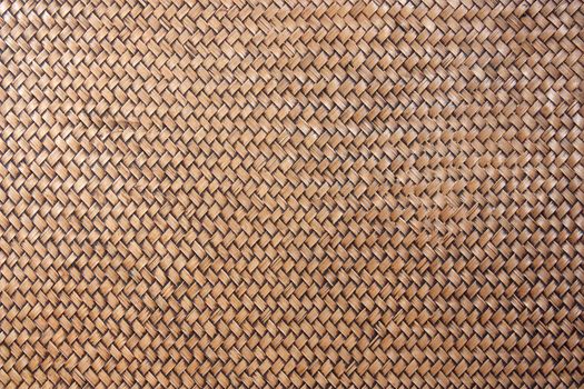 Woven rattan with natural patterns, vintage wall.