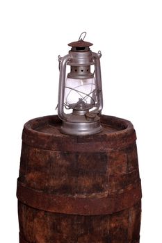 wooden barrel with oil lamp