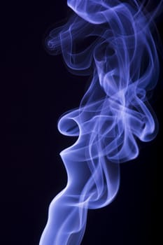 blue smoke over black background