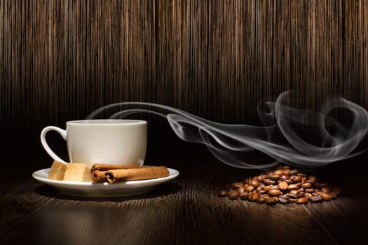 Image of coffee beans and white cup