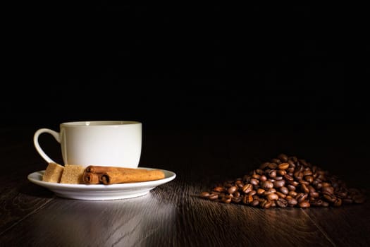 Image of coffee beans and white cup