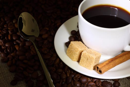 Image of coffee beans and white cup