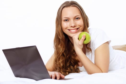 Portrait of a young woman with notebook