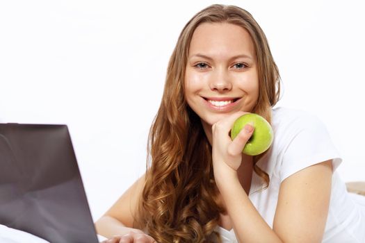 Portrait of a young woman with notebook