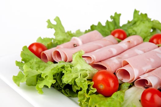 sliced Meat with tomatoes and salad