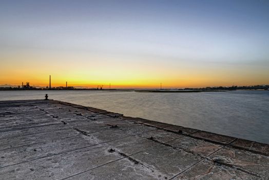 Sunset in the old docks of the Tejo river.