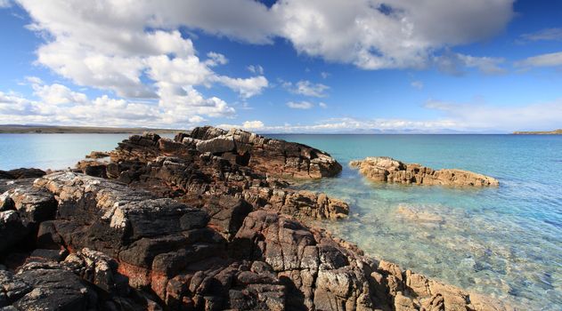 Beach on Gailoch peninsular over looking isle of skye