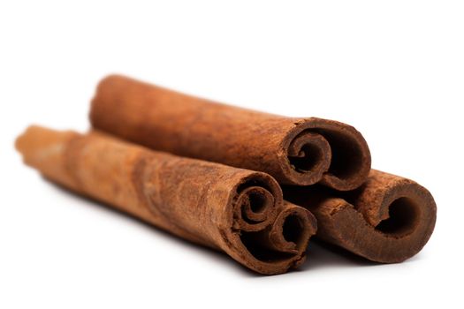 Cinnamon sticks spice isolated over white background