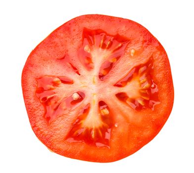 Closeup view of a section of tomato isolated on the white