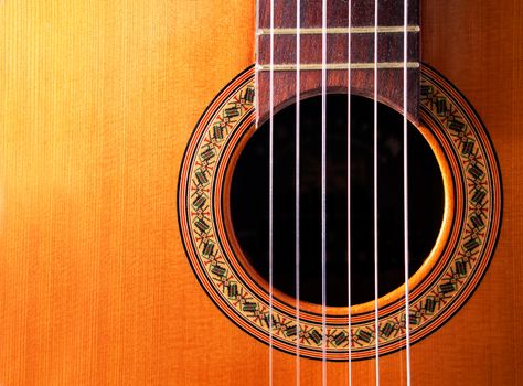 Close up image of spanish guitar with copyspace