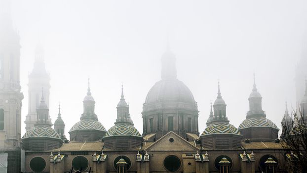 Detail of the domes of ancient architecture with fog