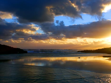 Awesome sunset where the Merri River empties into the sea at Warrnambool, Australia.