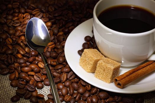 Image of coffee beans and white cup