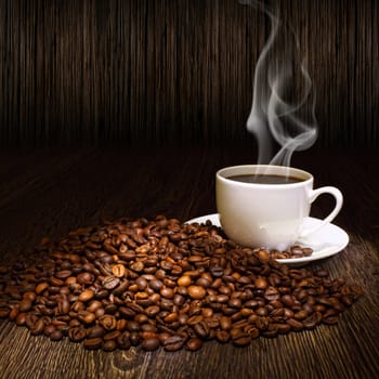 Image of coffee beans and white cup