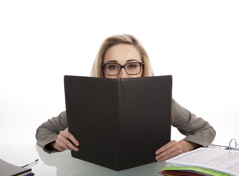 young successful business woman in the office with folder at work isolated on white background