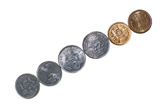 Close up of  row of Indian Coins, 5 rupees, 2 rupees, 1 rupee, isolated, copy space,
