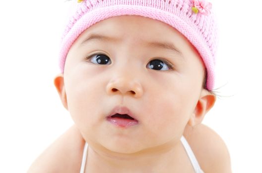 Curious Asian baby girl, isolated on white background