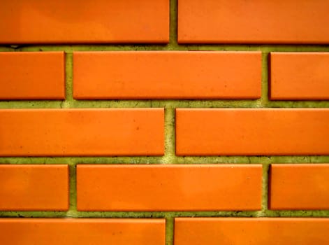 the wall was built of red bricks