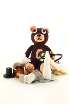 Teddy Bear with various medications and stethoscope