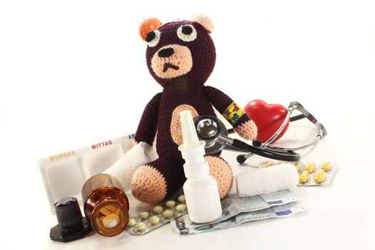 Teddy Bear with various medications and stethoscope
