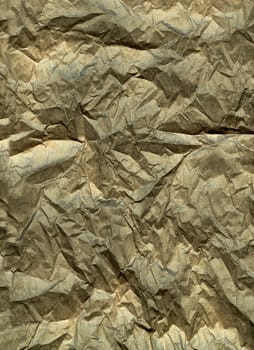 Wrinkled brown silk paper background texture.