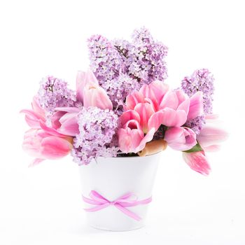 Bouquet from pink tulips and lilac on white