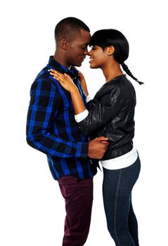 African young couple deeply in love. About to kiss