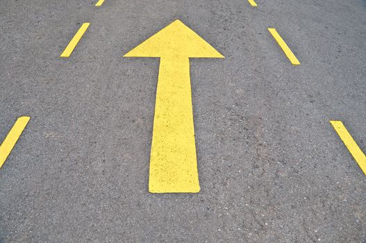 The Forwarded yellow arrow on the road