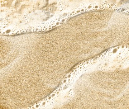 Soft wave of the sea on the clean sandy beach.