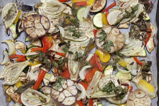 oven baked summer vegetables - food background