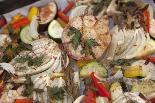 oven baked summer vegetables - food background