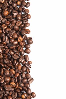 Coffee beans on a white background with a copy space.