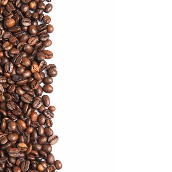 Coffee beans on a white background with a copy space.