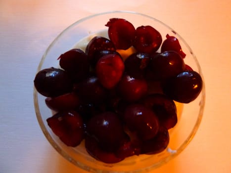 bowl of fresh cherries on white background