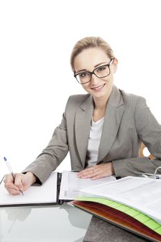 business woman with folders on desk at office isolated