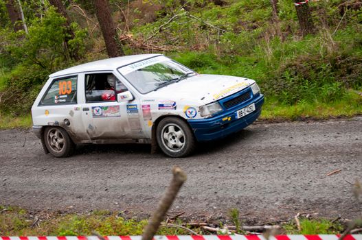 MALLOW, IRELAND - MAY 19: J. Shinnors driving Opel Corsa at the Jim Walsh Cork Forest Rally on May 19, 2012 in Mallow, Ireland. 4th round of the Valvoline National Forest Rally Championship.