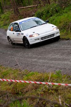 MALLOW, IRELAND - MAY 19: M. Ryan driving Honda Civic at the Jim Walsh Cork Forest Rally on May 19, 2012 in Mallow, Ireland. 4th round of the Valvoline National Forest Rally Championship.