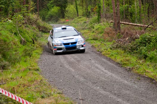 MALLOW, IRELAND - MAY 19: V. Mcaree driving Mitsubishi Evo at the Jim Walsh Cork Forest Rally on May 19, 2012 in Mallow, Ireland. 4th round of the Valvoline National Forest Rally Championship.