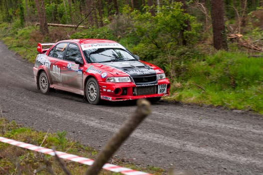 MALLOW, IRELAND - MAY 19: S. Wright driving Mitsubishi Evo at the Jim Walsh Cork Forest Rally on May 19, 2012 in Mallow, Ireland. 4th round of the Valvoline National Forest Rally Championship.