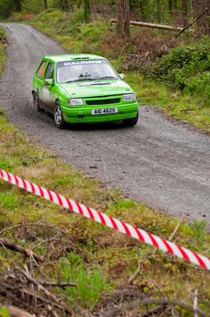 MALLOW, IRELAND - MAY 19: K. Culliname driving Opel Corsa at the Jim Walsh Cork Forest Rally on May 19, 2012 in Mallow, Ireland. 4th round of the Valvoline National Forest Rally Championship.
