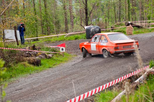 MALLOW, IRELAND - MAY 19: J. Kenneally driving Ford Escort at the Jim Walsh Cork Forest Rally on May 19, 2012 in Mallow, Ireland. 4th round of the Valvoline National Forest Rally Championship.