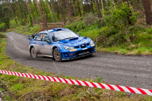 MALLOW, IRELAND - MAY 19: M. Cairns driving Subaru Impreza at the Jim Walsh Cork Forest Rally on May 19, 2012 in Mallow, Ireland. 4th round of the Valvoline National Forest Rally Championship.