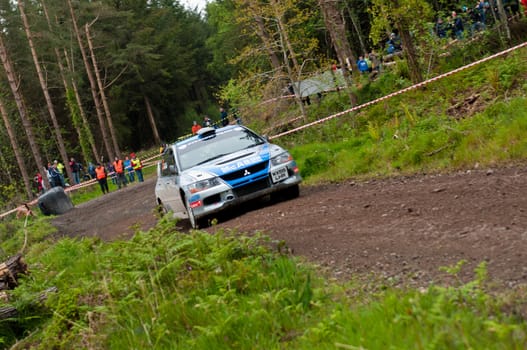 MALLOW, IRELAND - MAY 19: V. Mcaree driving Mitsubishi Evo at the Jim Walsh Cork Forest Rally on May 19, 2012 in Mallow, Ireland. 4th round of the Valvoline National Forest Rally Championship.