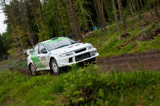 MALLOW, IRELAND - MAY 19: J. Laverty driving Mitsubishi Evo at the Jim Walsh Cork Forest Rally on May 19, 2012 in Mallow, Ireland. 4th round of the Valvoline National Forest Rally Championship.