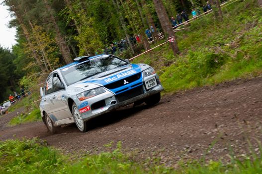 MALLOW, IRELAND - MAY 19: V. Mcaree driving Mitsubishi Evo at the Jim Walsh Cork Forest Rally on May 19, 2012 in Mallow, Ireland. 4th round of the Valvoline National Forest Rally Championship.