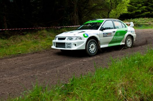 MALLOW, IRELAND - MAY 19: J. Laverty driving Mitsubishi Evo at the Jim Walsh Cork Forest Rally on May 19, 2012 in Mallow, Ireland. 4th round of the Valvoline National Forest Rally Championship.